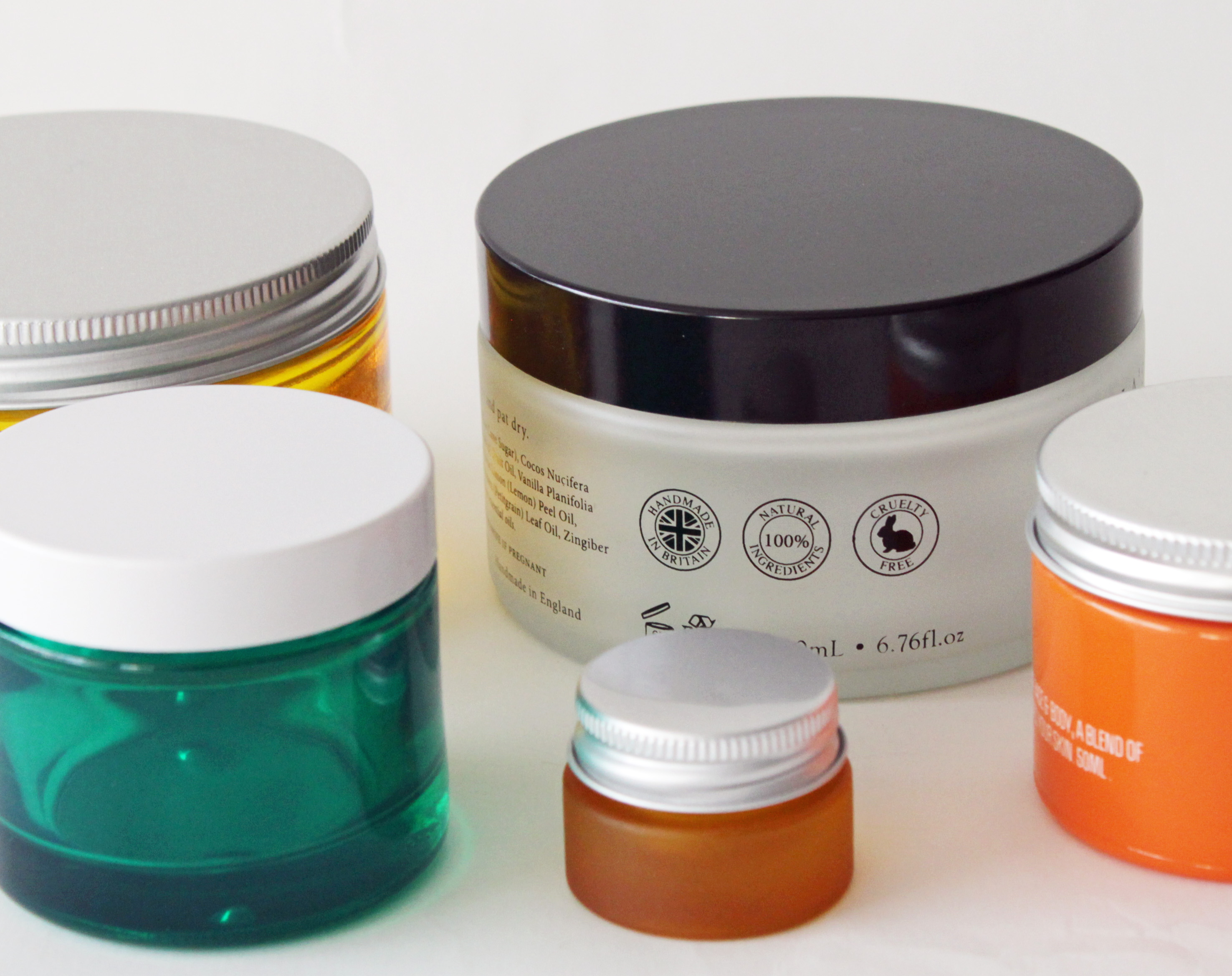 Clear and Coloured Glass Cosmetic Jars for everyone big and small.